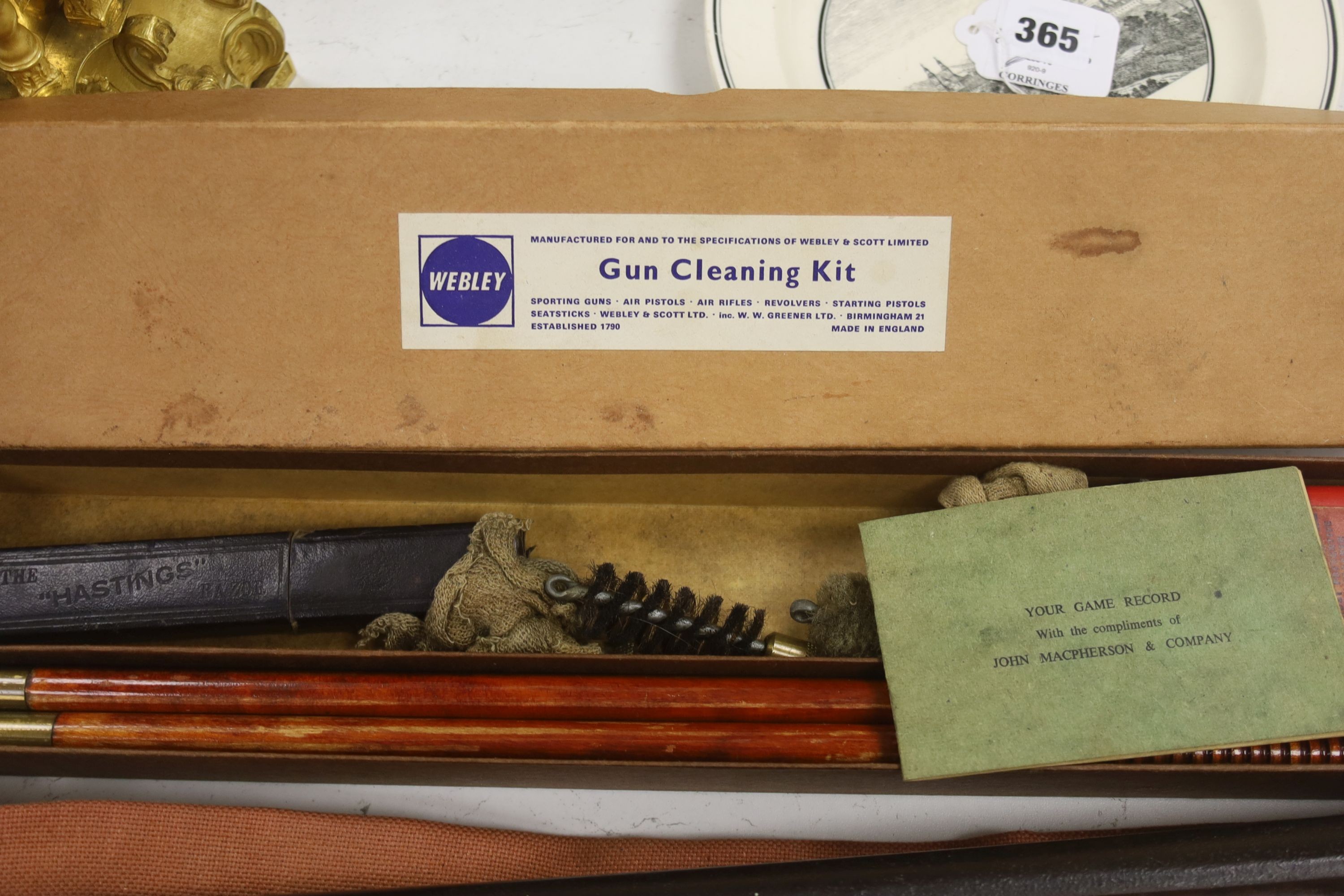 A 19th century percussion rifle, walnut stock, with ram rod, in canvas case, complete with gun cleaning kit